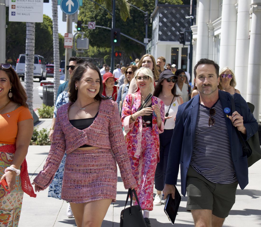 Brian leading a tour group down a Beverly Hills sidewalk
