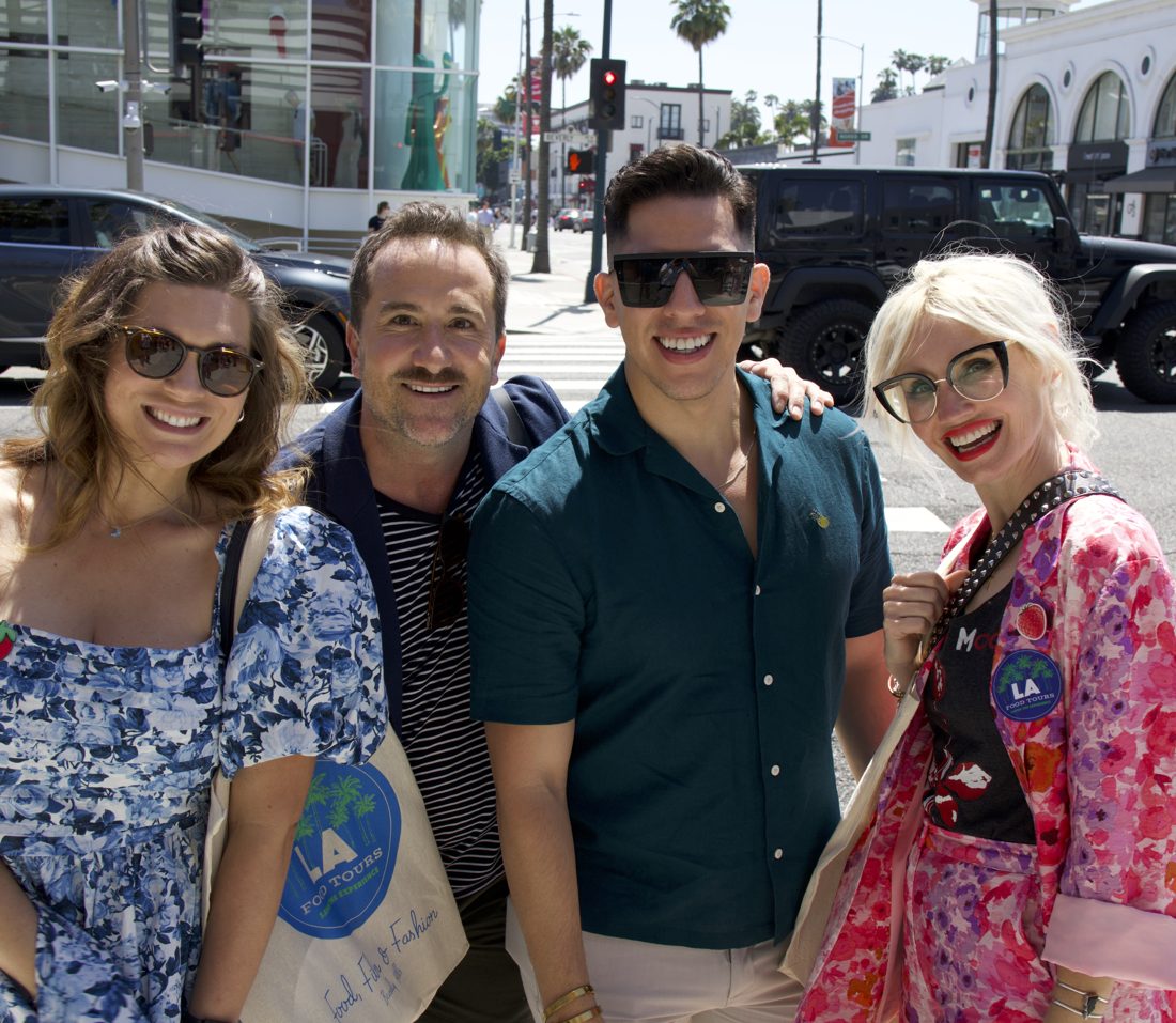 Brian with guests carrying LA Food Tours Food, Film & Fashion tote bags on a Beverly Hills corner