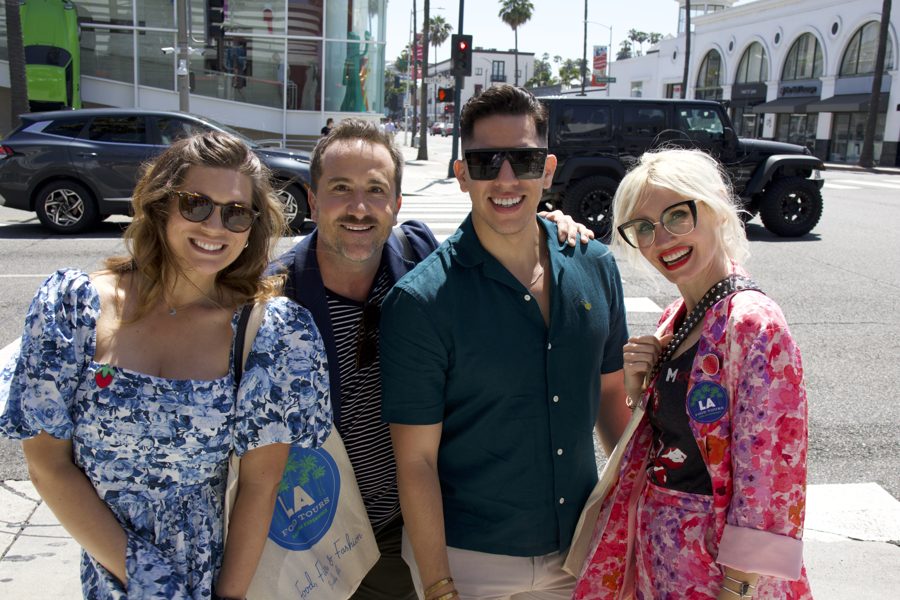 Brian with guests carrying Food, Film & Fashion tote bags in Beverly Hills