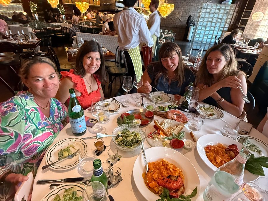 Guests sharing a feast at Bad Roman