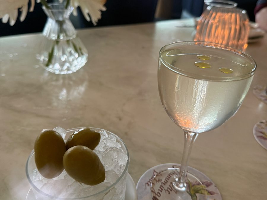 A classic martini with olives